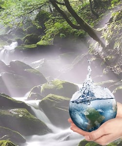 Waterfall  with a woman holding a sphere of the earth